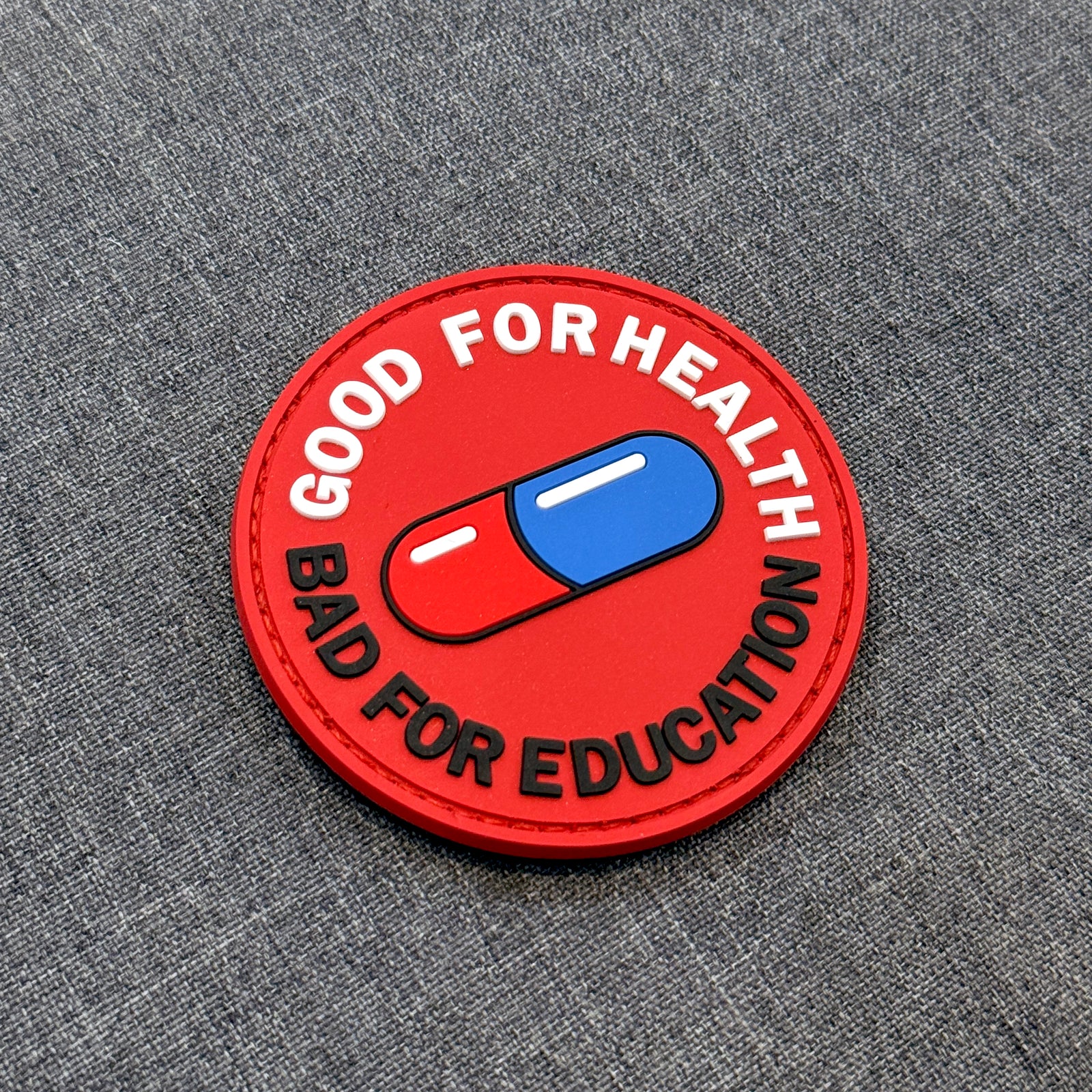 Display of Akira Good for Health Bad for Education PVC patch – Akira Gallery