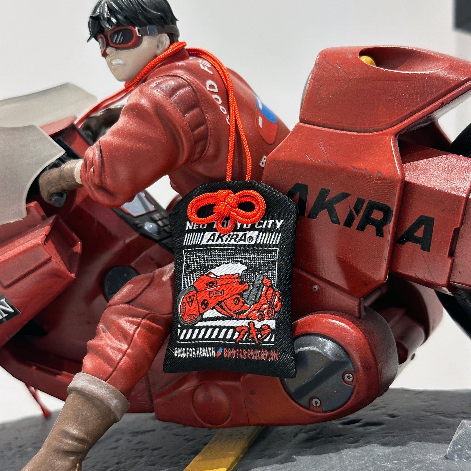 Akira omamori with Kaneda traditional motorcycle 
