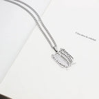 Anime-inspired Survey Corps emblem necklace in stainless steel
