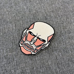 Detail of Colossal Titan embroidered patch showing textured stitching – anime patch – Akira Gallery
