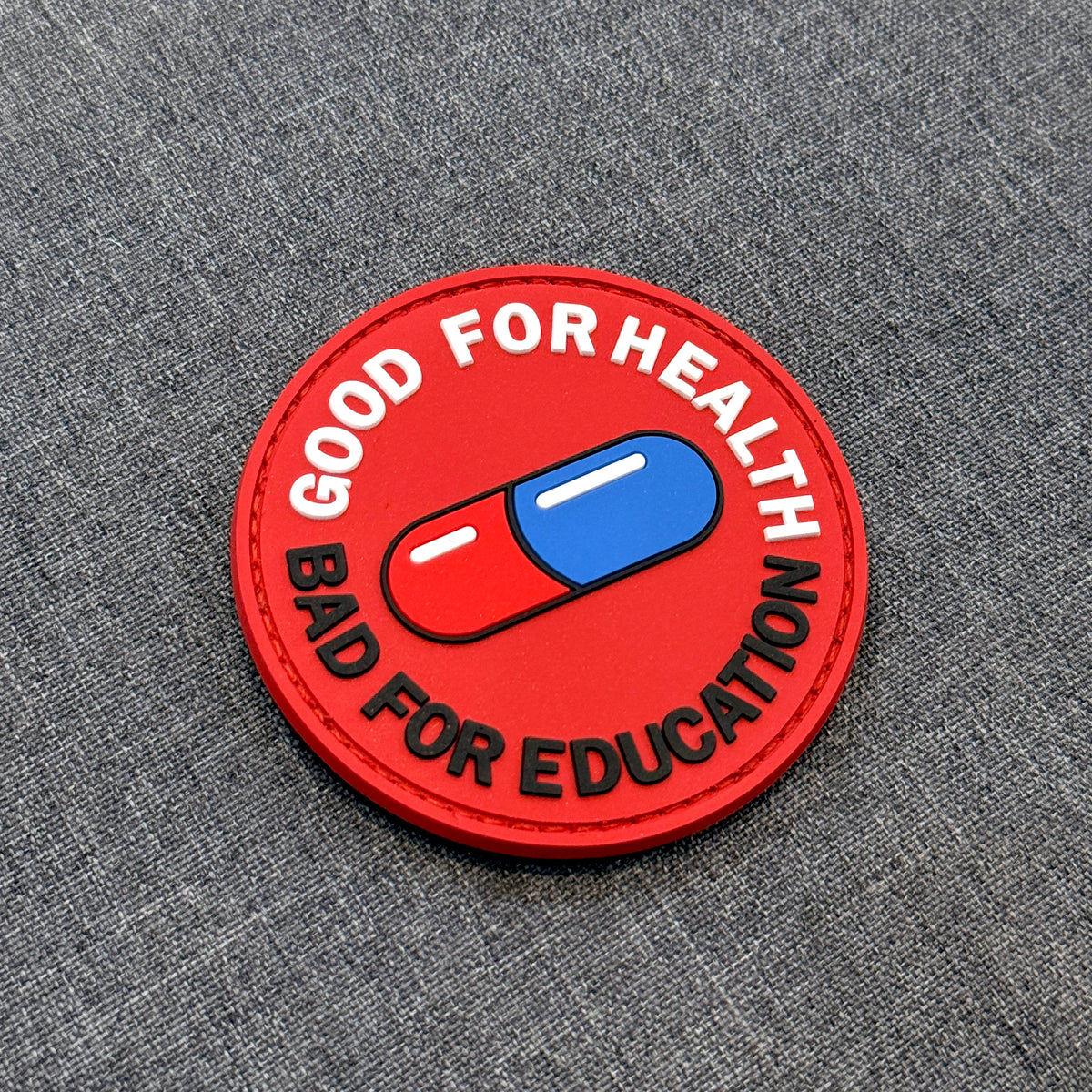 Display of Akira Good for Health Bad for Education PVC patch – Akira Gallery
