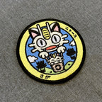 Display View of Meowth embroidered iron-on patch inspired by Japanese manhole covers – 8 cm – Akira Gallery
