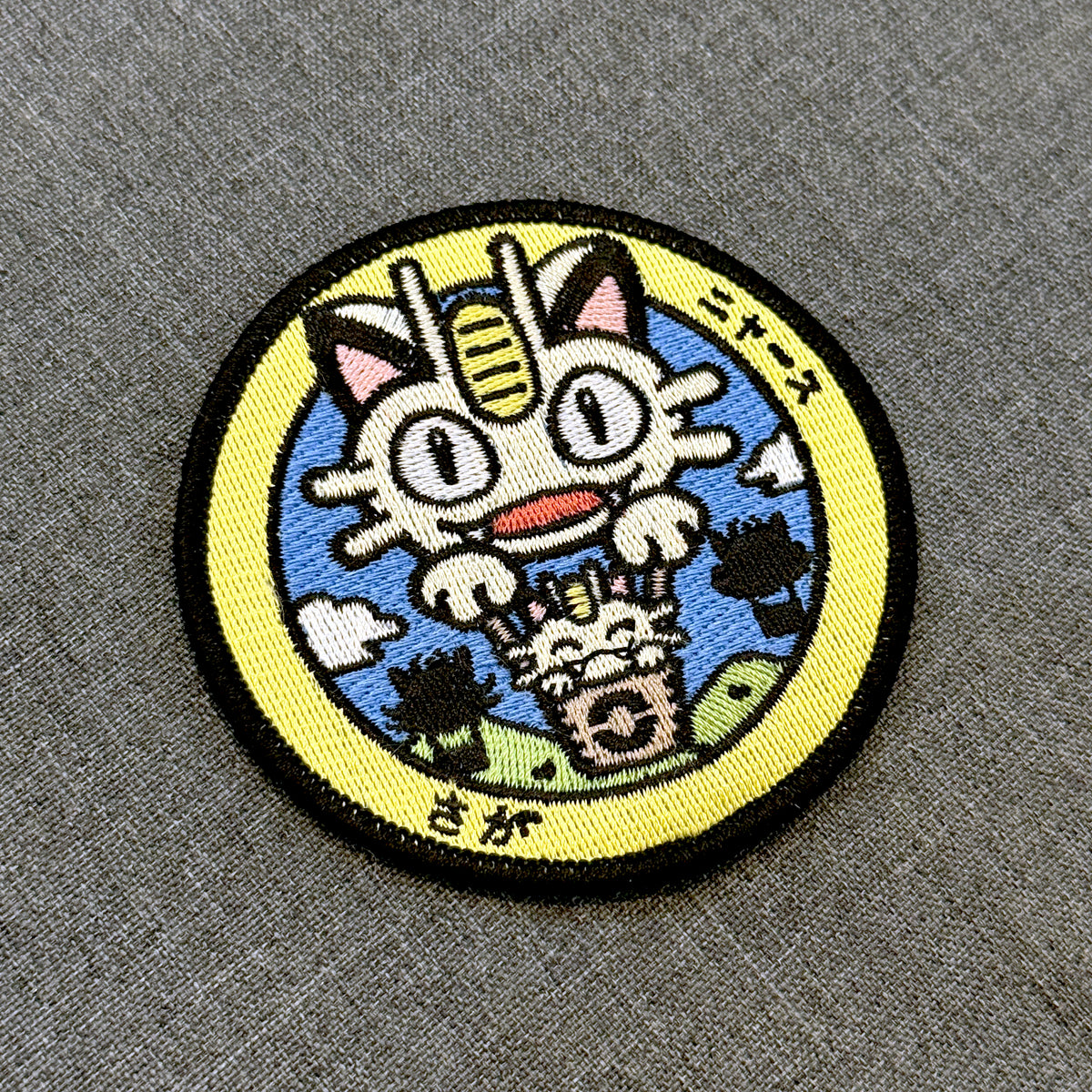 Display View of Meowth embroidered iron-on patch inspired by Japanese manhole covers – 8 cm – Akira Gallery
