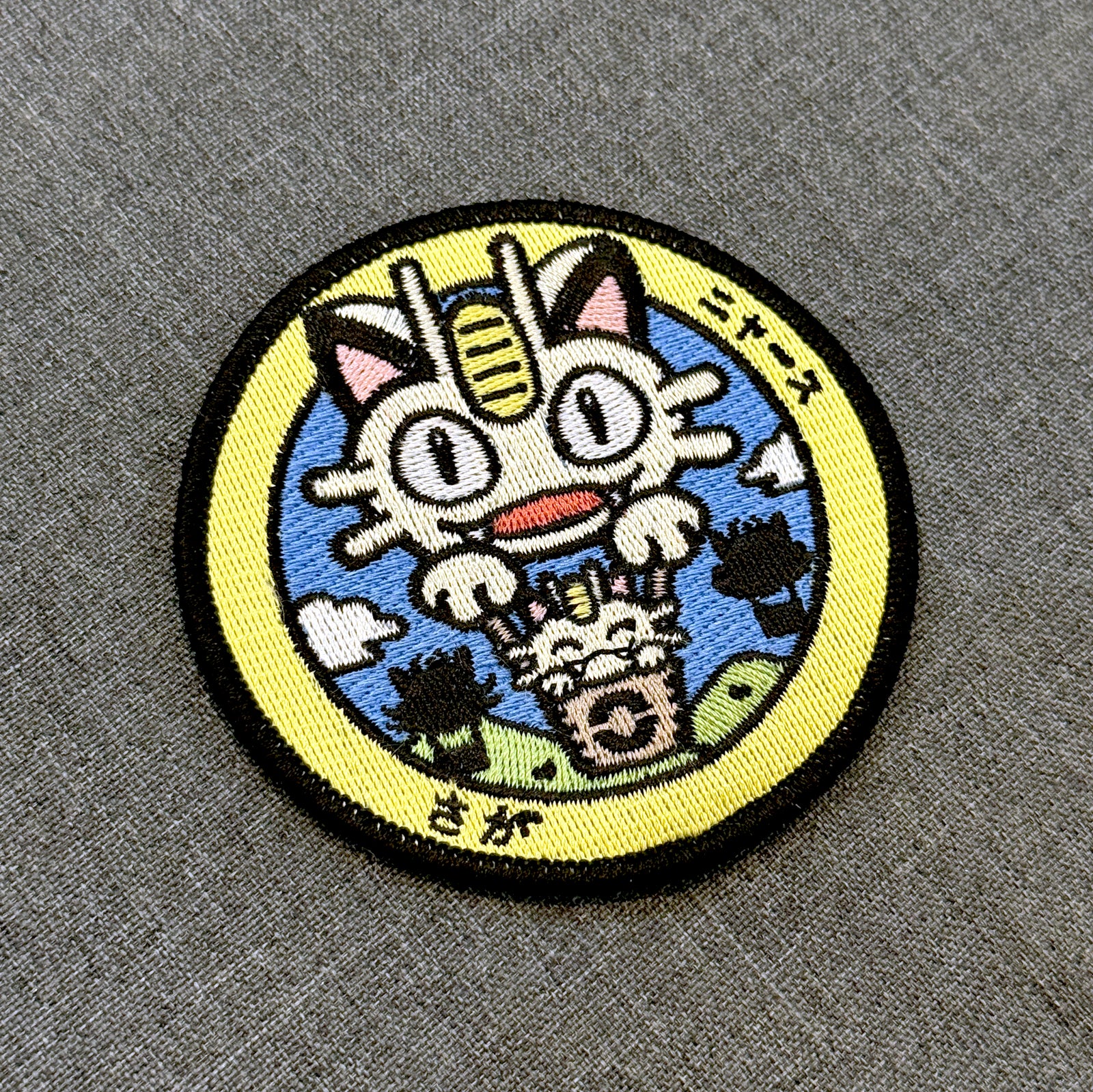 Display View of Meowth embroidered iron-on patch inspired by Japanese manhole covers – 8 cm – Akira Gallery
