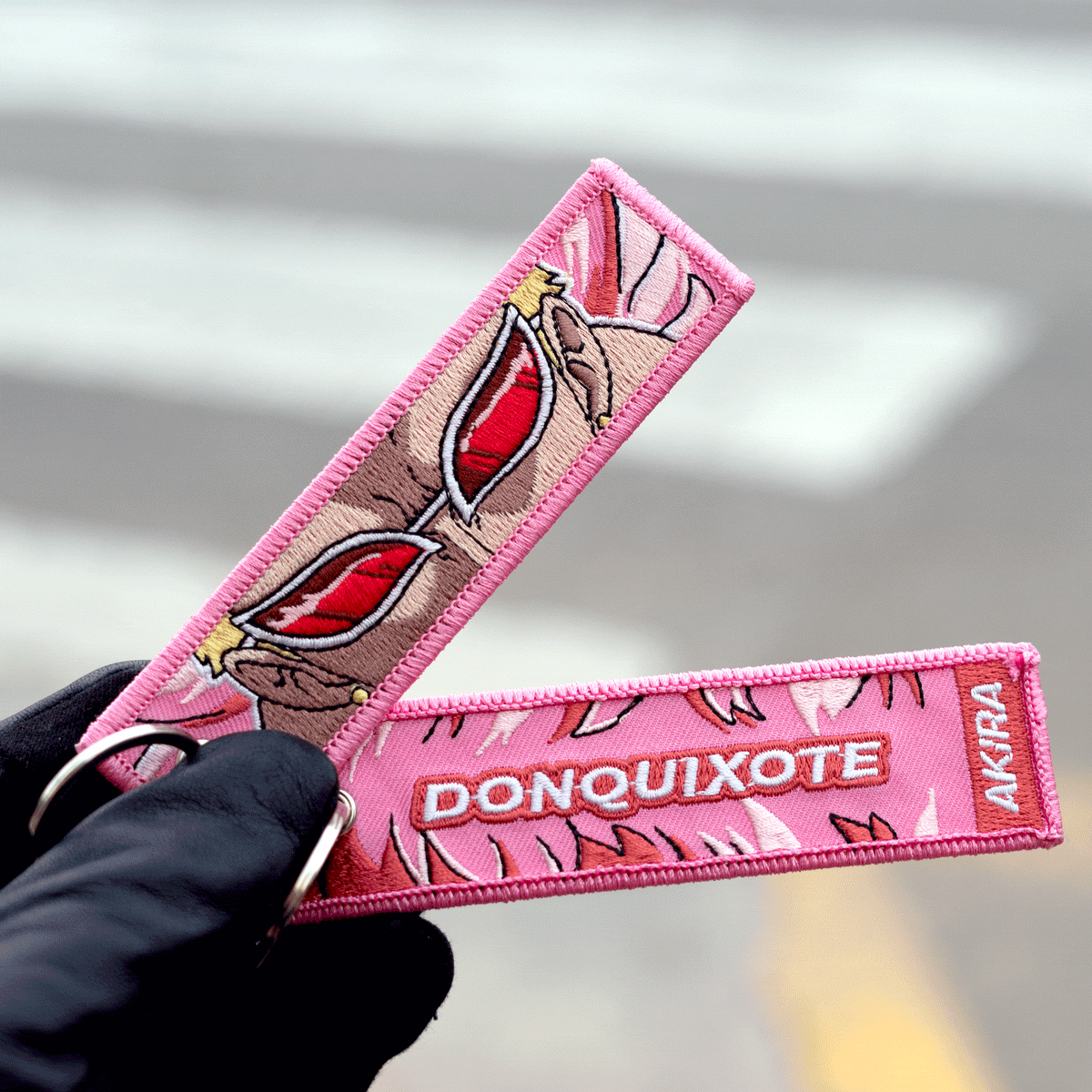 Detail of Donquixote Doflamingo embroidered keychain – soft fabric anime keychain – Akira Gallery
