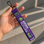 Eva 01 Wrist Lanyard or phone strap from anime Evangelion held by hand