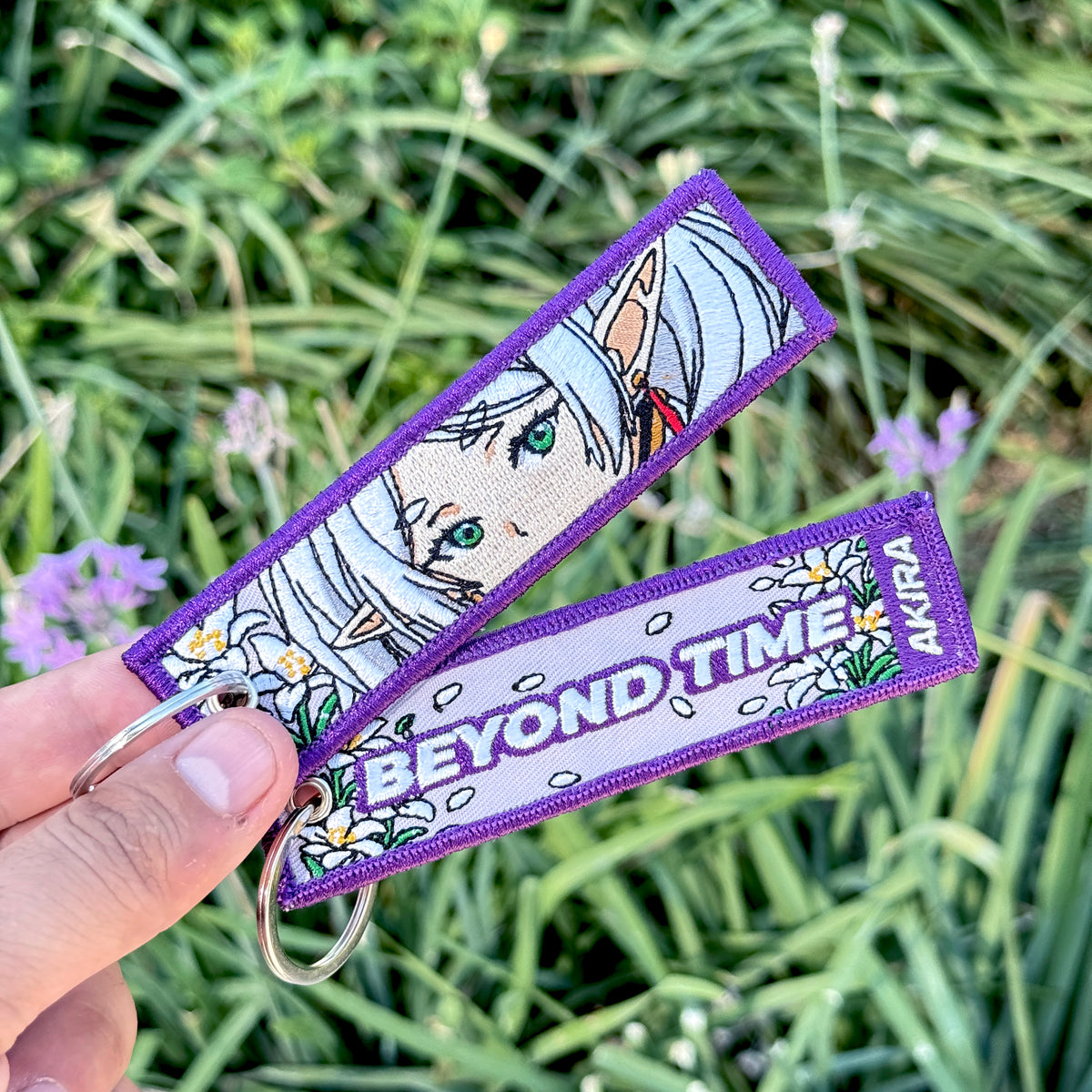 Frieren embroidered keychain in purple fabric