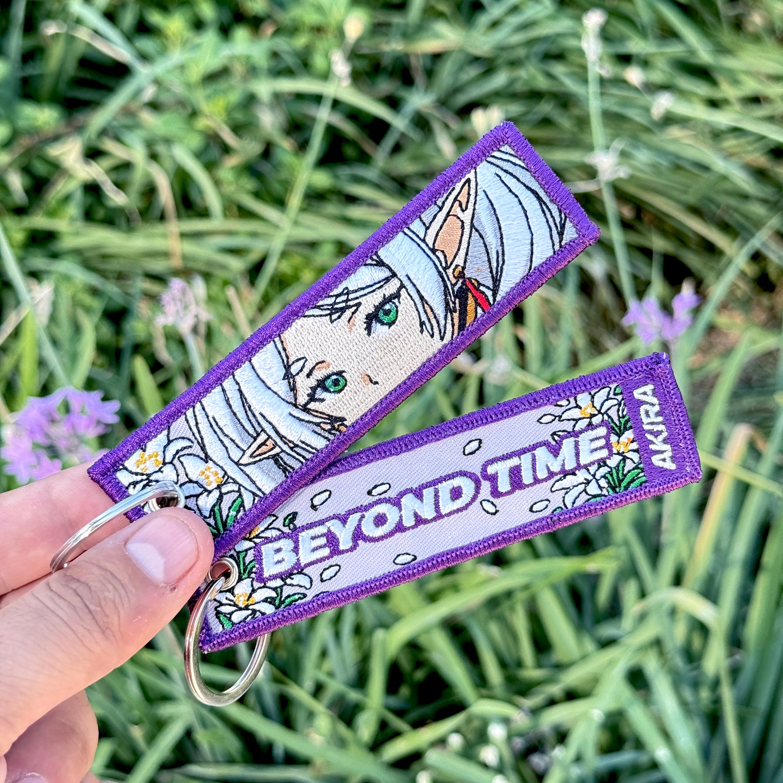 Frieren embroidered keychain in purple fabric