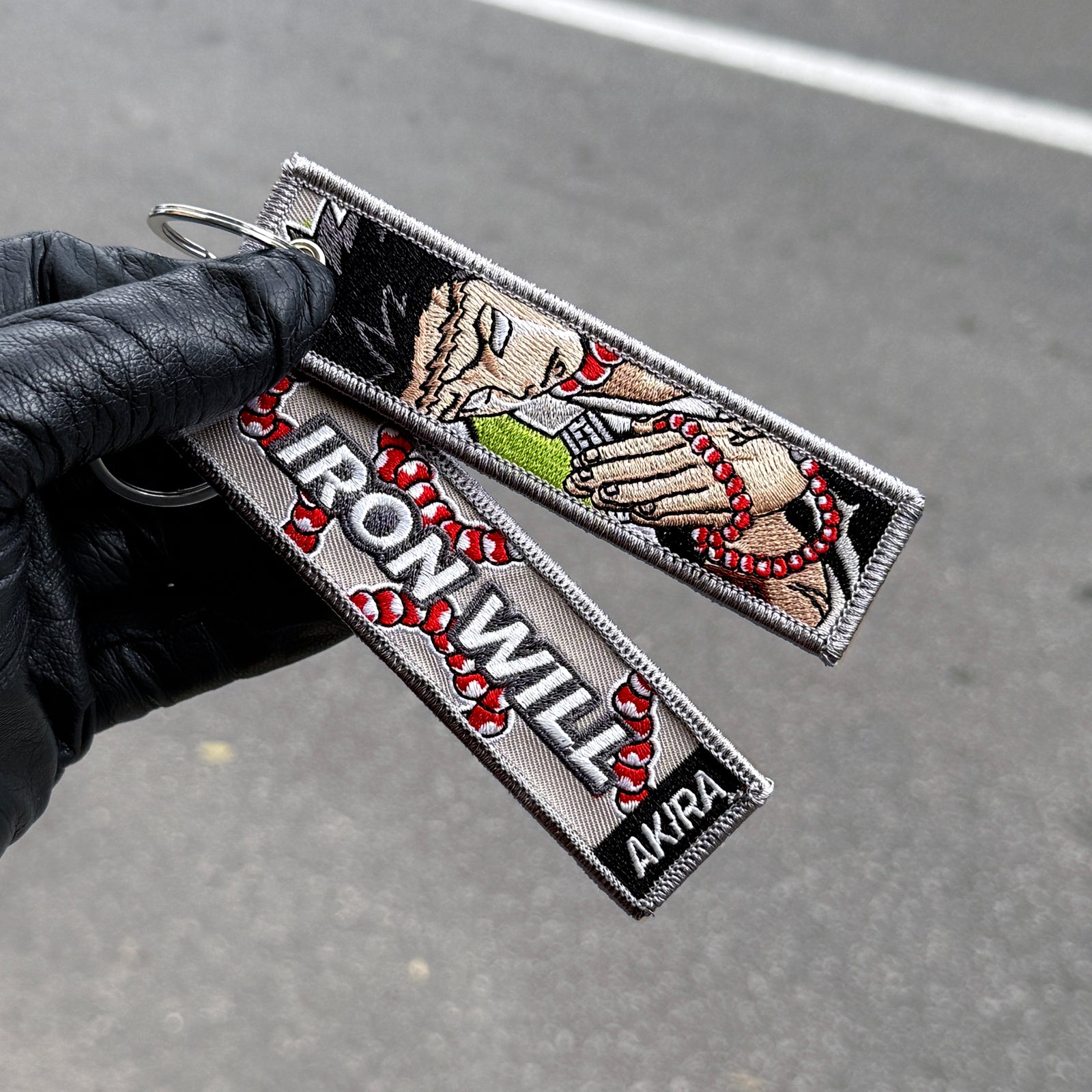 Detail of Gyomei Himejima embroidered anime keytag inspired by Demon Slayer – Akira Gallery
