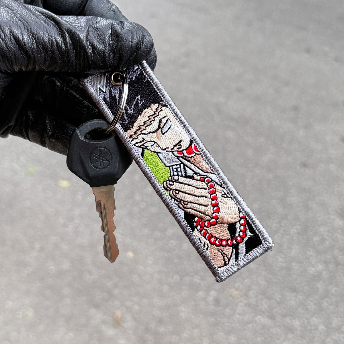 Detail of Gyomei Himejima embroidered keytag – soft fabric anime keychain – Akira Gallery
