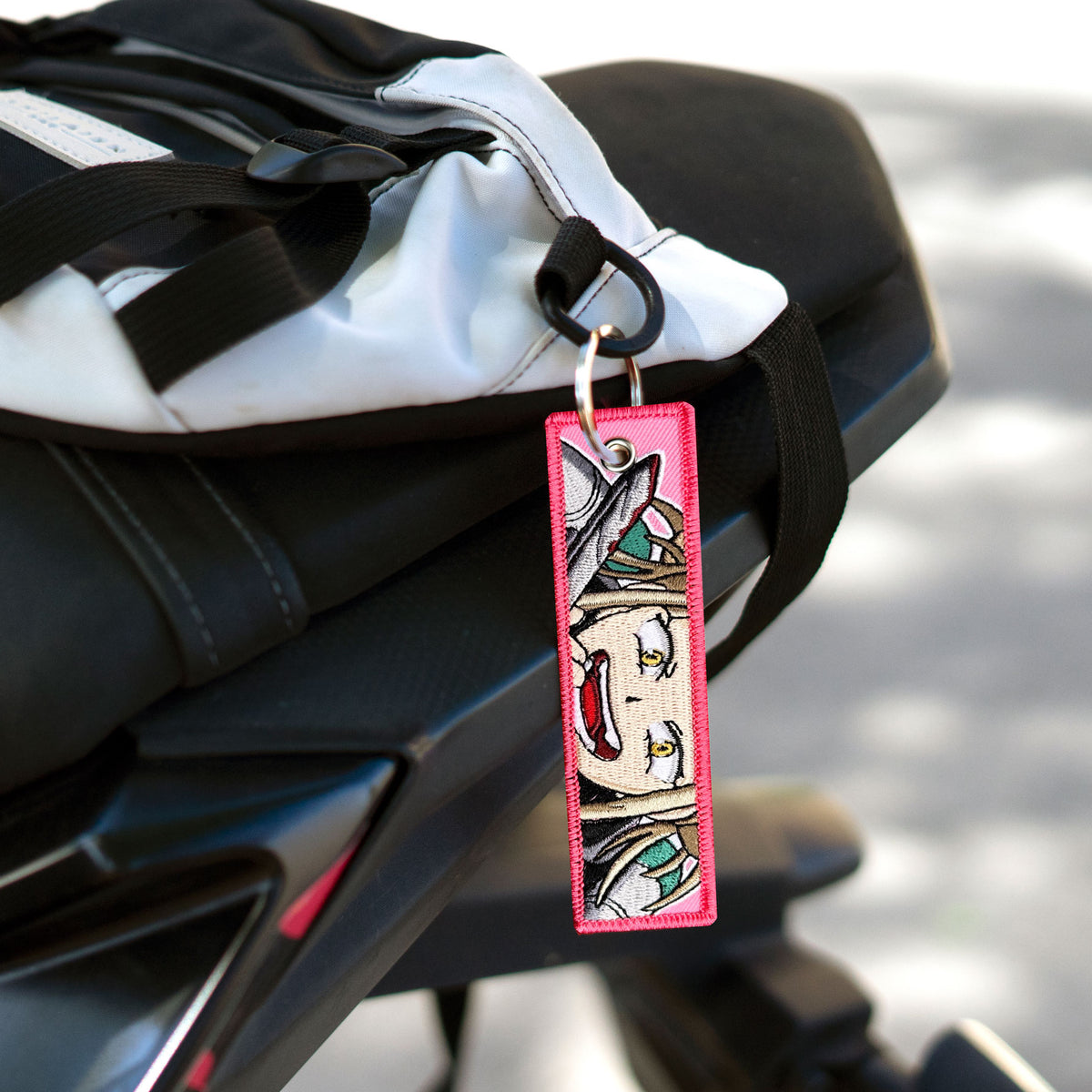 Detail of Himiko Toga embroidered keychain – soft fabric anime keychain – Akira Gallery
