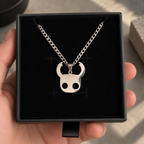 Hollow Knight Hero Stainless Steel Necklace inspired by Hollow Knight Game Displayed on a box