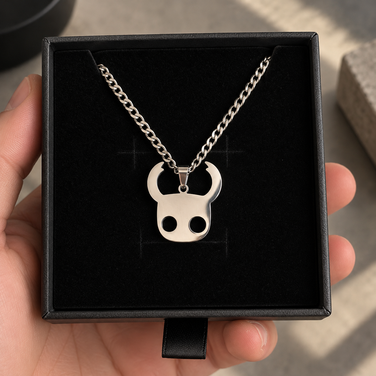 Hollow Knight Hero Stainless Steel Necklace inspired by Hollow Knight Game Displayed on a box