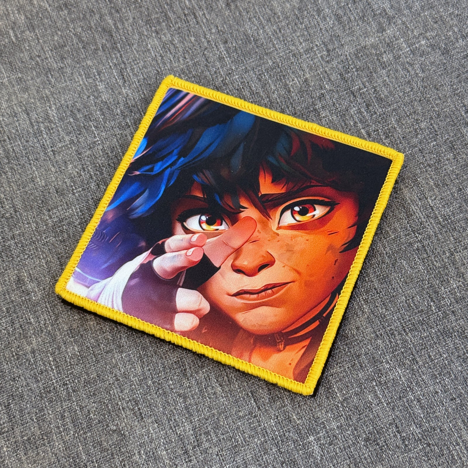 Display of Isha anime velcro patch inspired by Arcane – Akira Gallery