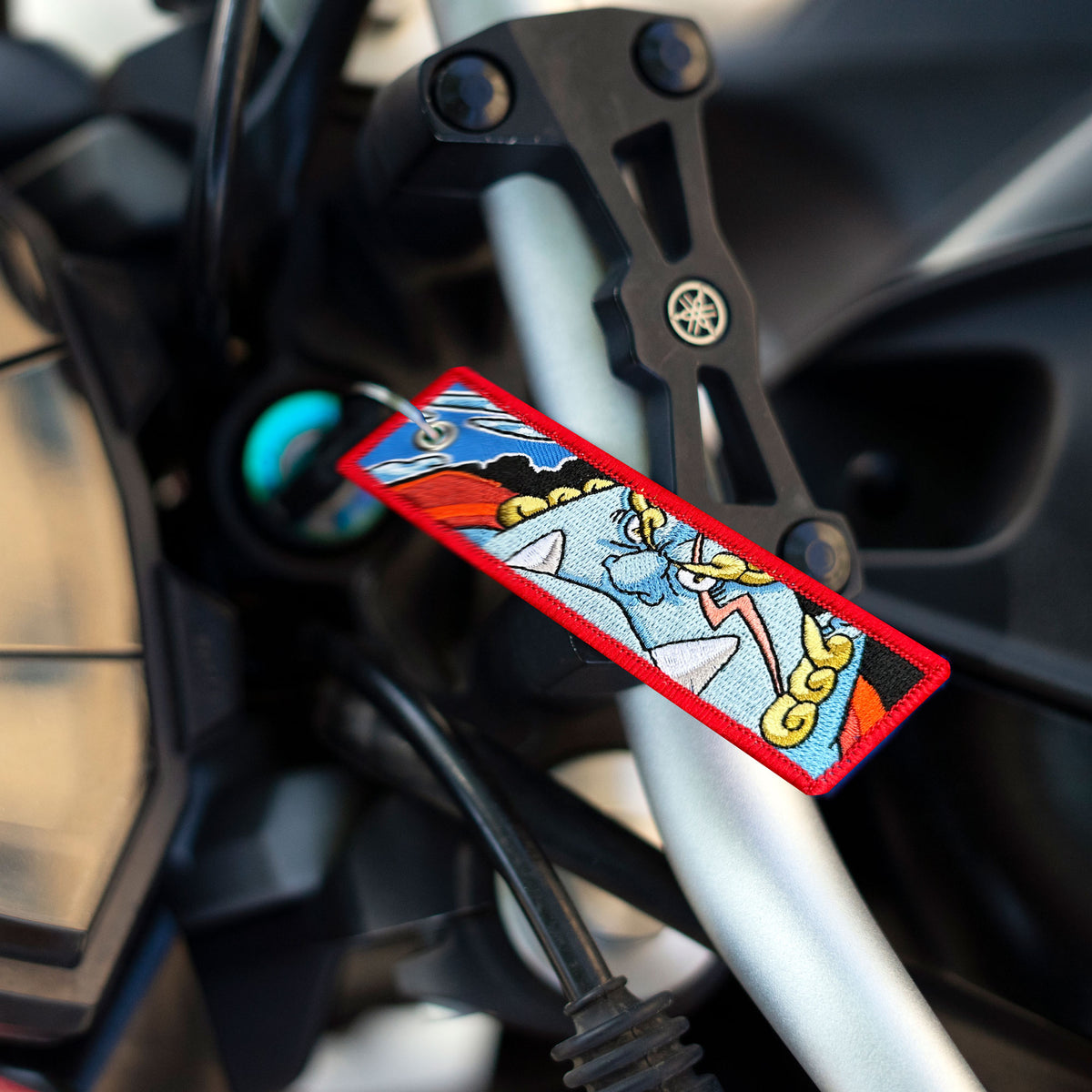 Front view of Jinbe embroidered keychain – anime keychain – Akira Gallery
