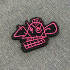 Display of Jinx symbol embroidered anime patch inspired by Arcane with velcro backing – Akira Gallery
