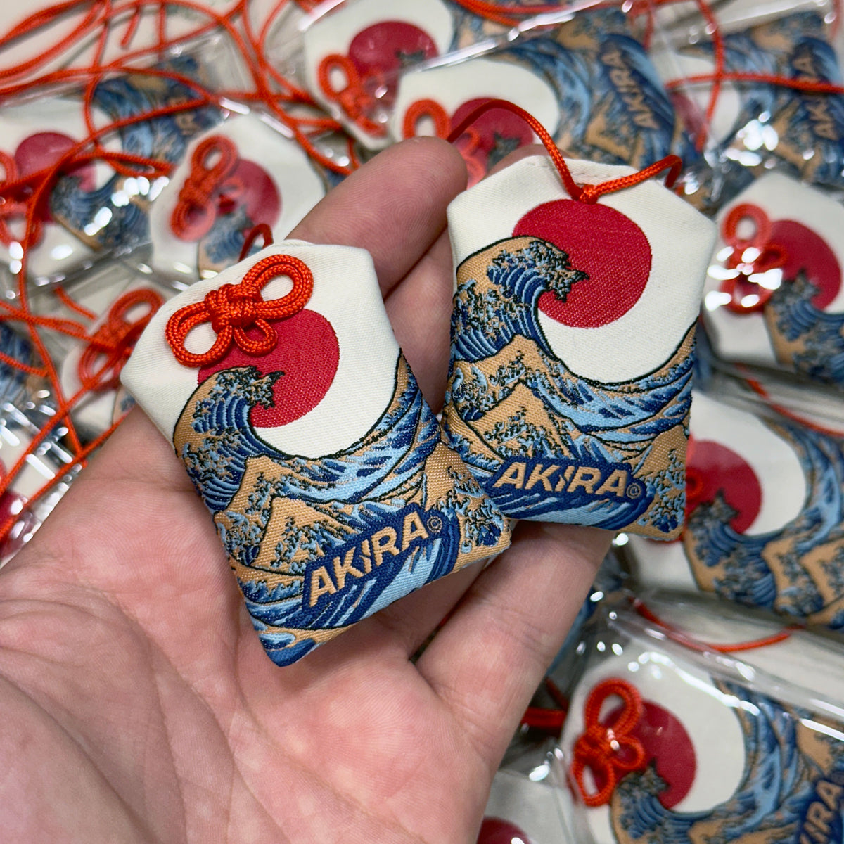 Japanese style omamori featuring the Great Wave of Kanagawa
