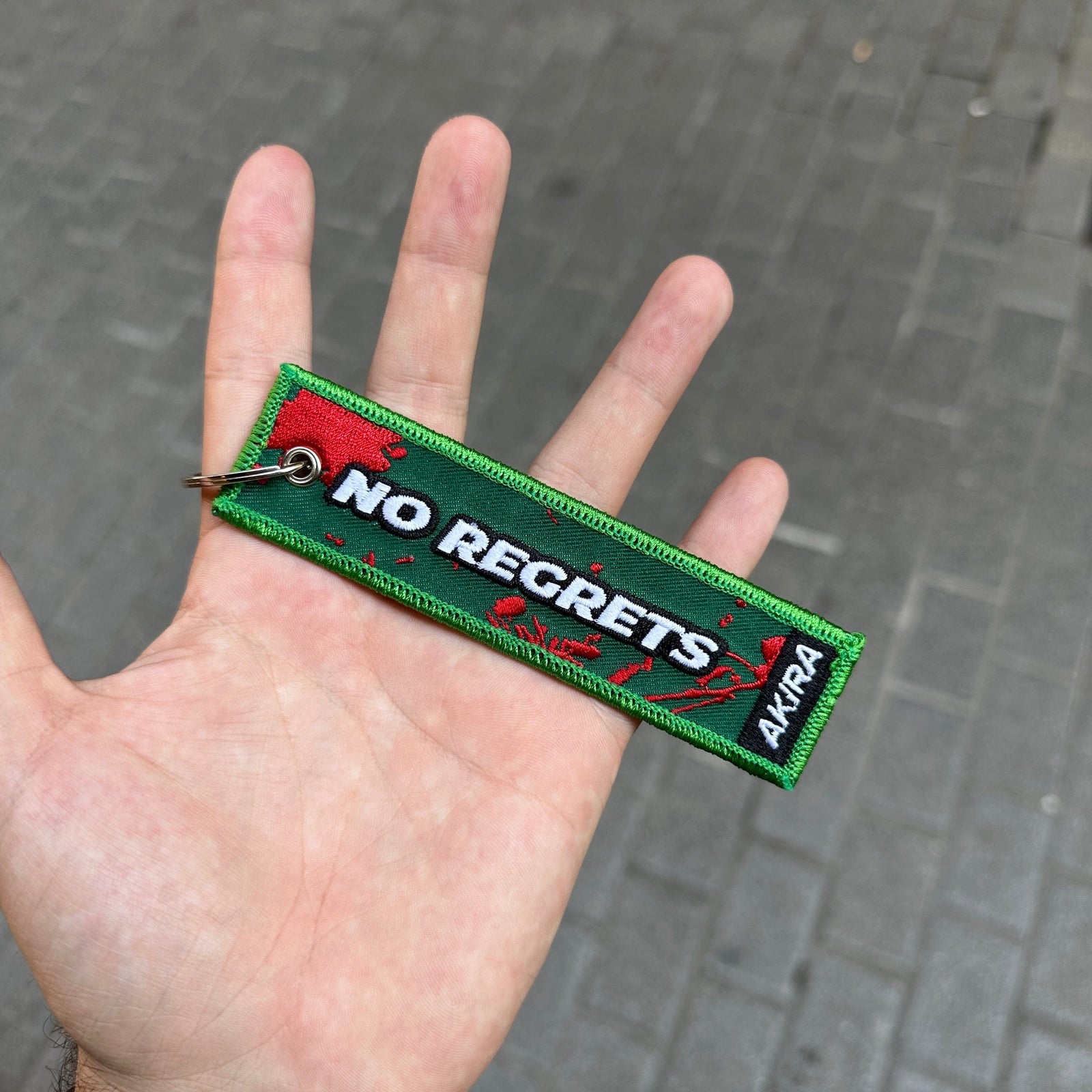 Back view of Levi Ackerman embroidered keychain – anime keychain – Akira Gallery
