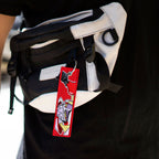Detail of Lucifer embroidered keychain – soft fabric anime-style keychain – Akira Gallery
