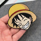 Detail of Luffy embroidered patch showing textured stitching – One Piece anime patch – Akira Gallery
