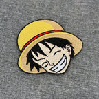 Display of Luffy embroidered patch showing textured stitching – One Piece anime patch – Akira Gallery
