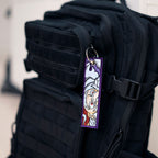 Display of Luffy Gear Five embroidered keychain – soft fabric anime keychain – Akira Gallery
