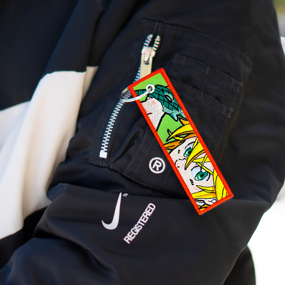 Detail of Meliodas embroidered keychain – soft fabric anime keychain – Akira Gallery
