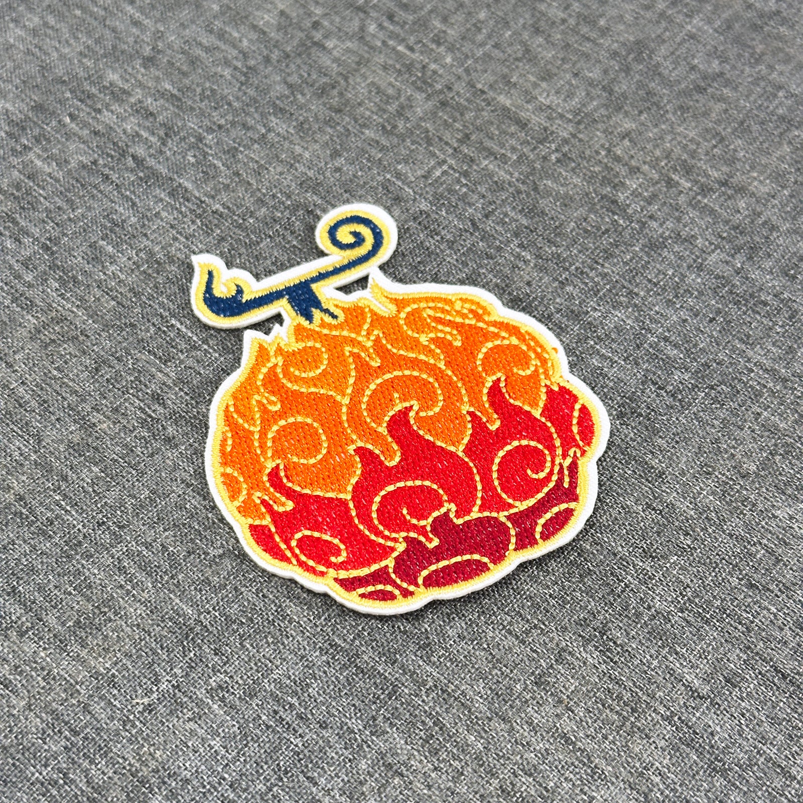 Embroidered Mera Mera no Mi patch from One Piece, iron-on anime patch with flame fruit design