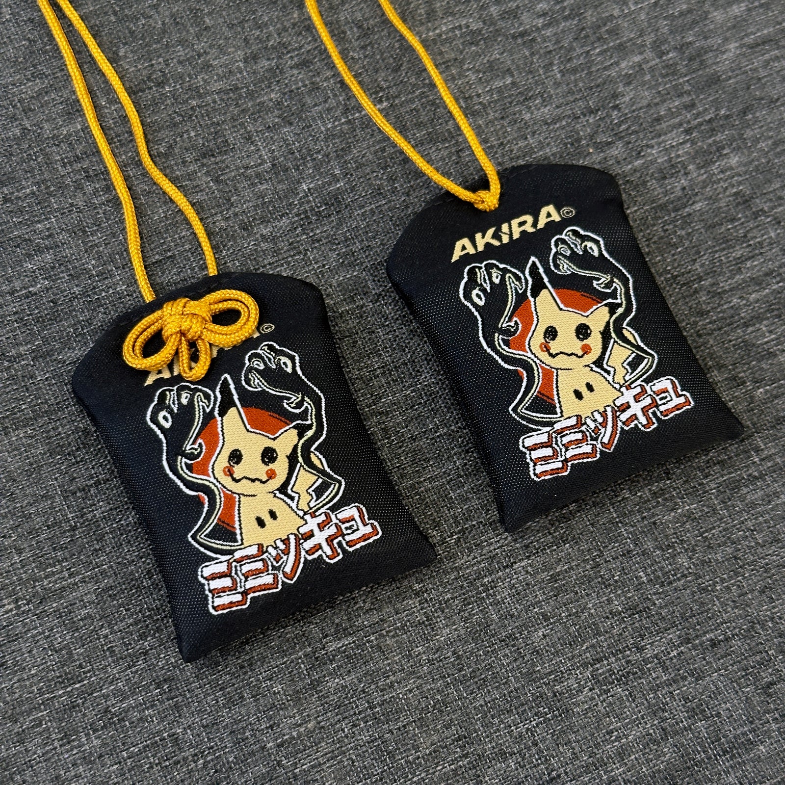 Mimikyu omamori inspired by Pokémon character design
