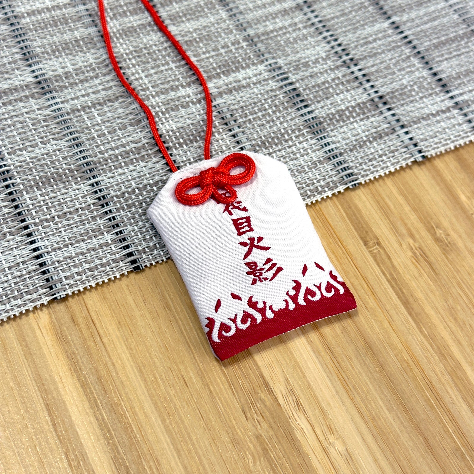 Minato Lucky Charm inspired by the trasditional japanese omamori