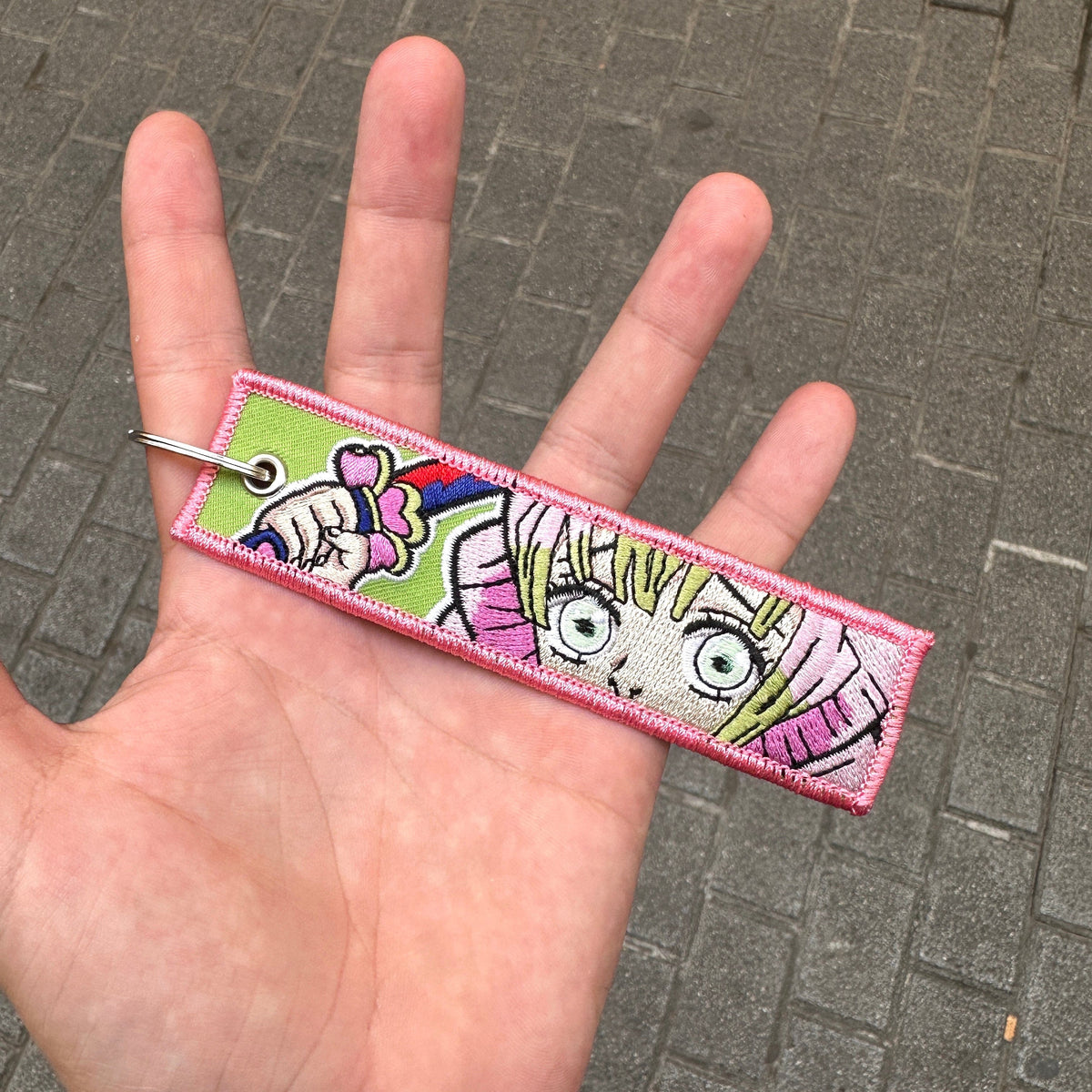 Front view of Mitsuri Kanroji embroidered keychain – anime keychain – Akira Gallery
kawaii