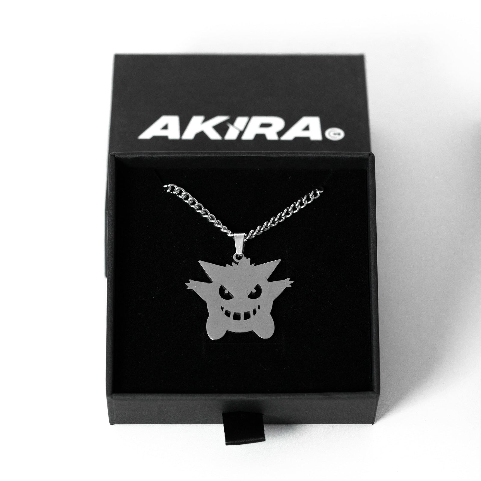 Minimalist Gengar pendant necklace for Pokémon fans
