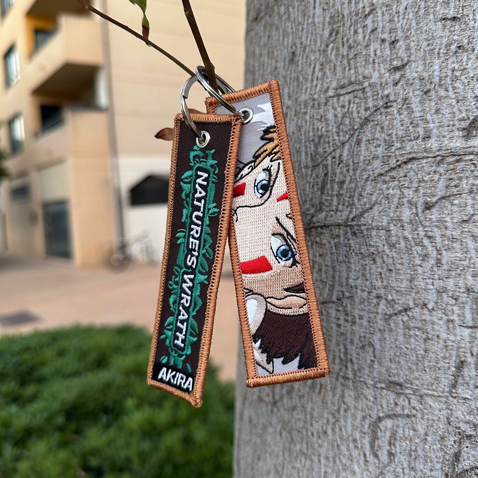 Detail of Princess Mononoke embroidered keychain with San – soft fabric anime keychain – Akira Gallery
