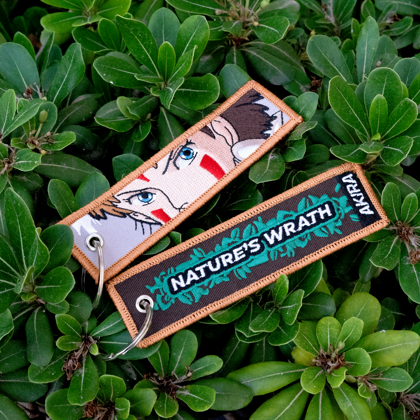 Display of Princess Mononoke embroidered keychain with San – soft fabric anime keychain – Akira Gallery
