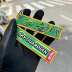 Display of Rayquaza embroidered keychain – soft fabric anime keychain – Akira Gallery
