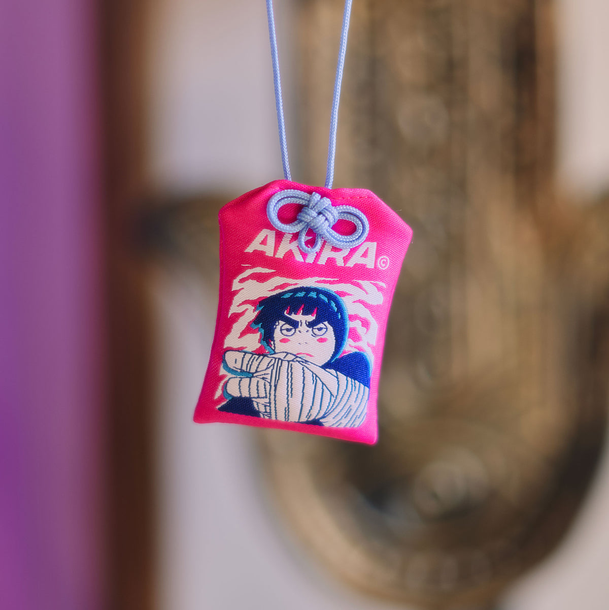 Rock Lee omamori decorative charm symbolizing perseverance
