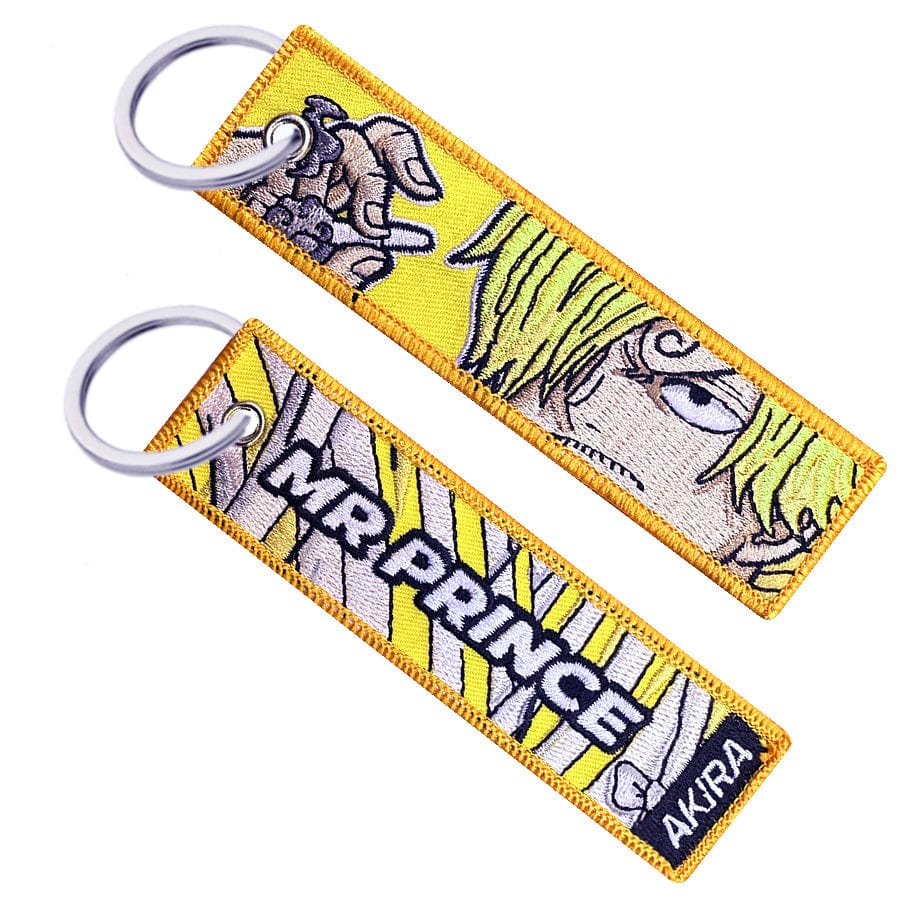 Double-sided embroidered keychain of Sanji from One Piece. One side features the word "Mr Prince" with the kimono pattern, and the other side shows Sanji holding a cigarette.