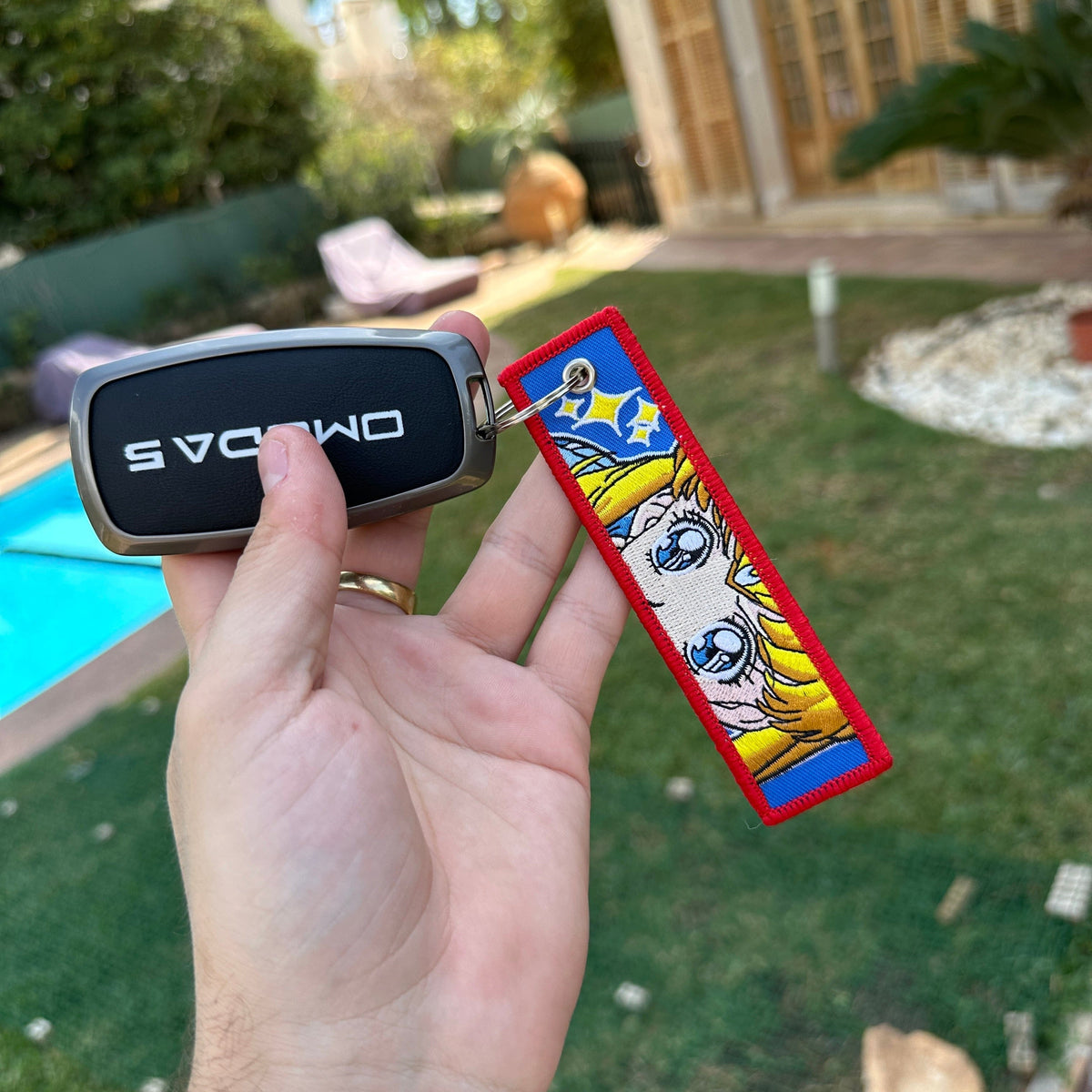 Display of Serena Usagi Tsukino embroidered keychain – soft fabric anime keychain – Akira Gallery
