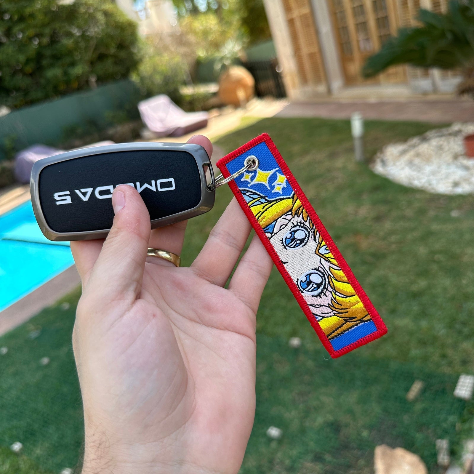 Display of Serena Usagi Tsukino embroidered keychain – soft fabric anime keychain – Akira Gallery
