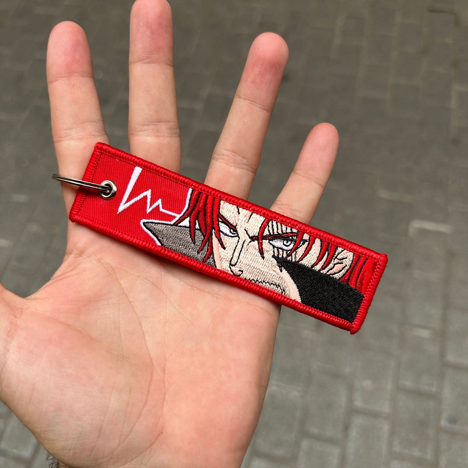 Front view of Shanks embroidered keychain – anime keychain – Akira Gallery
