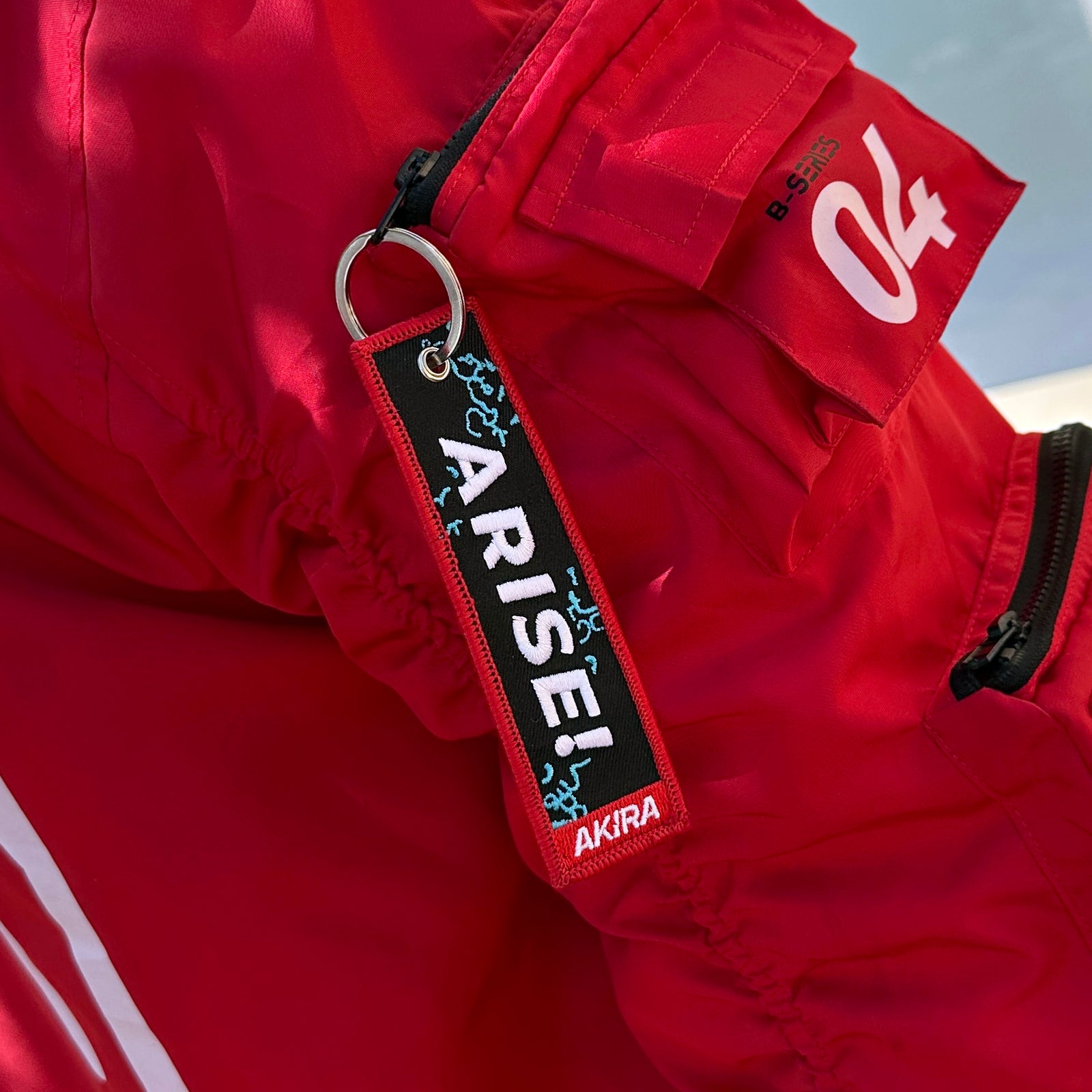 Back view of Sung Jin-Woo embroidered keychain – anime keychain – Akira Gallery
