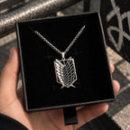Survey Corps Stainless Steel Necklace from anime Attack On Titan displayed on a box