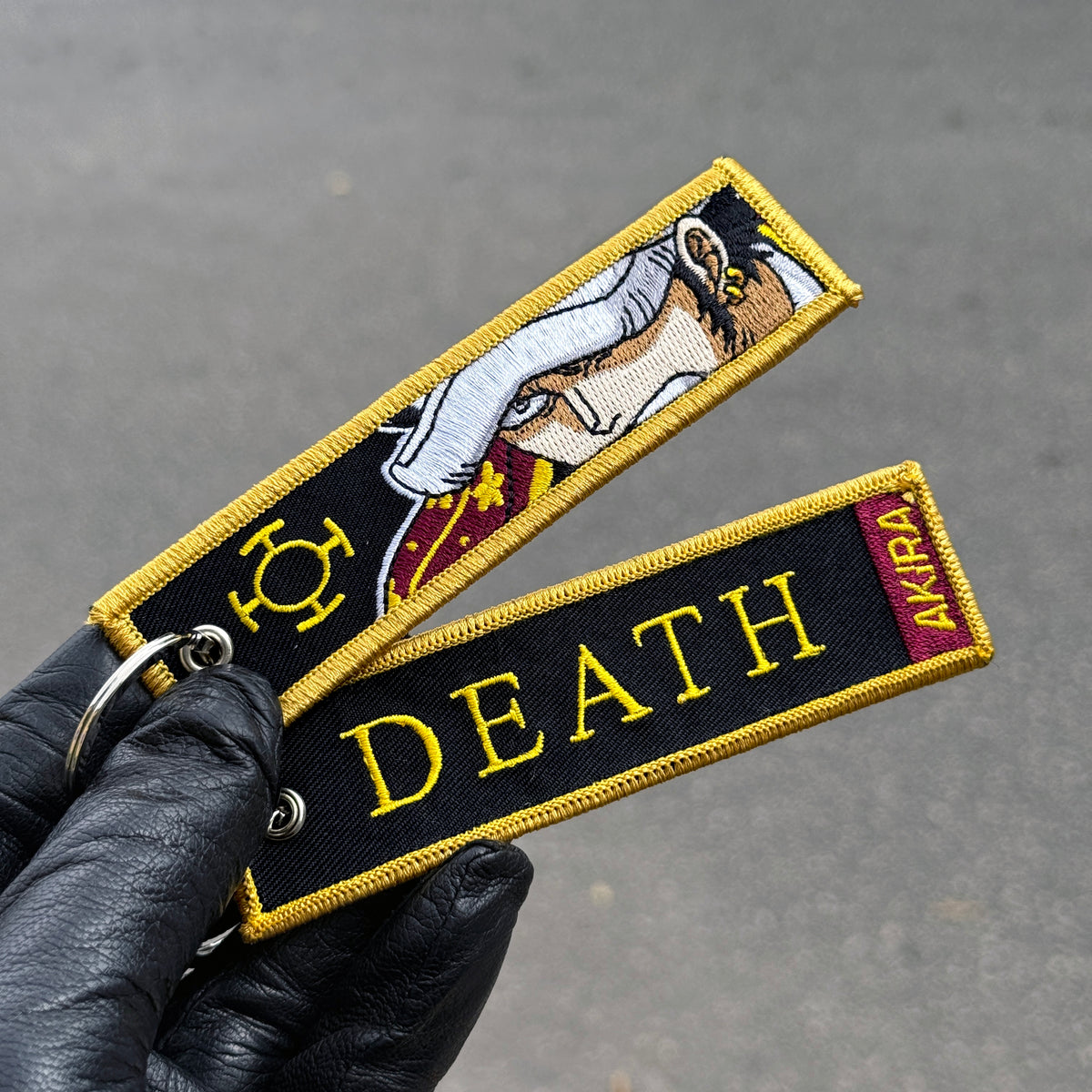 Detail of Trafalgar Law embroidered keychain – soft fabric anime keychain – Akira Gallery
