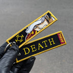 Detail of Trafalgar Law embroidered keychain – soft fabric anime keychain – Akira Gallery
