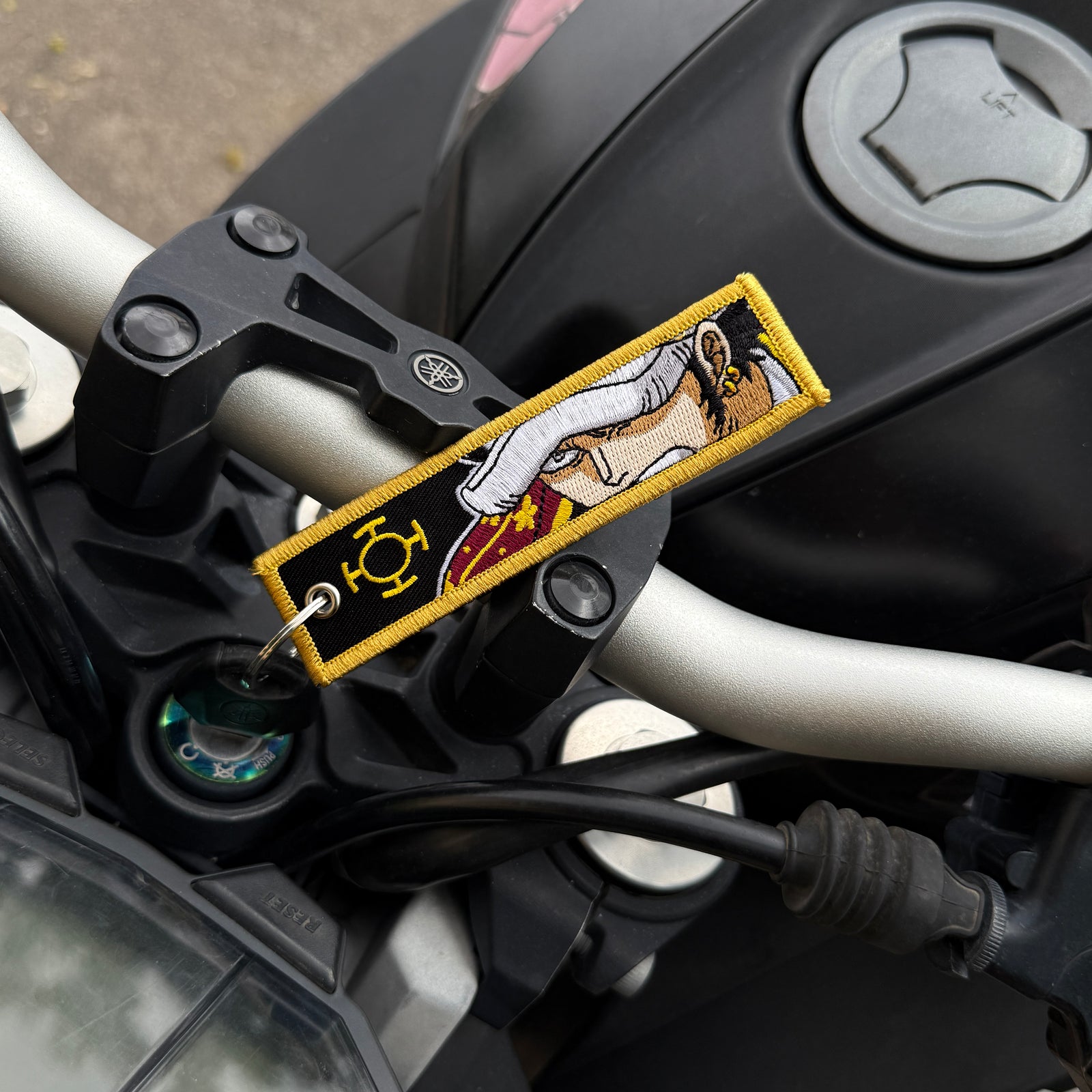 Front view of Trafalgar Law embroidered keychain – anime keychain – Akira Gallery
