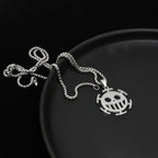 Minimalist Trafalgar Law skull pendant necklace for anime fans
