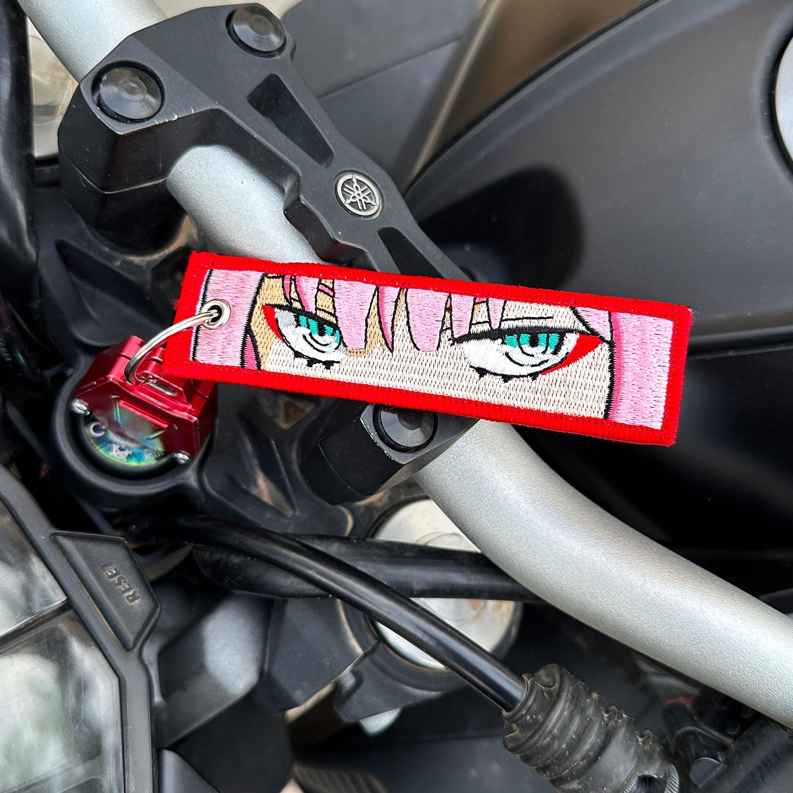 Front view of Zero Two embroidered keychain – anime keychain – Akira Gallery
