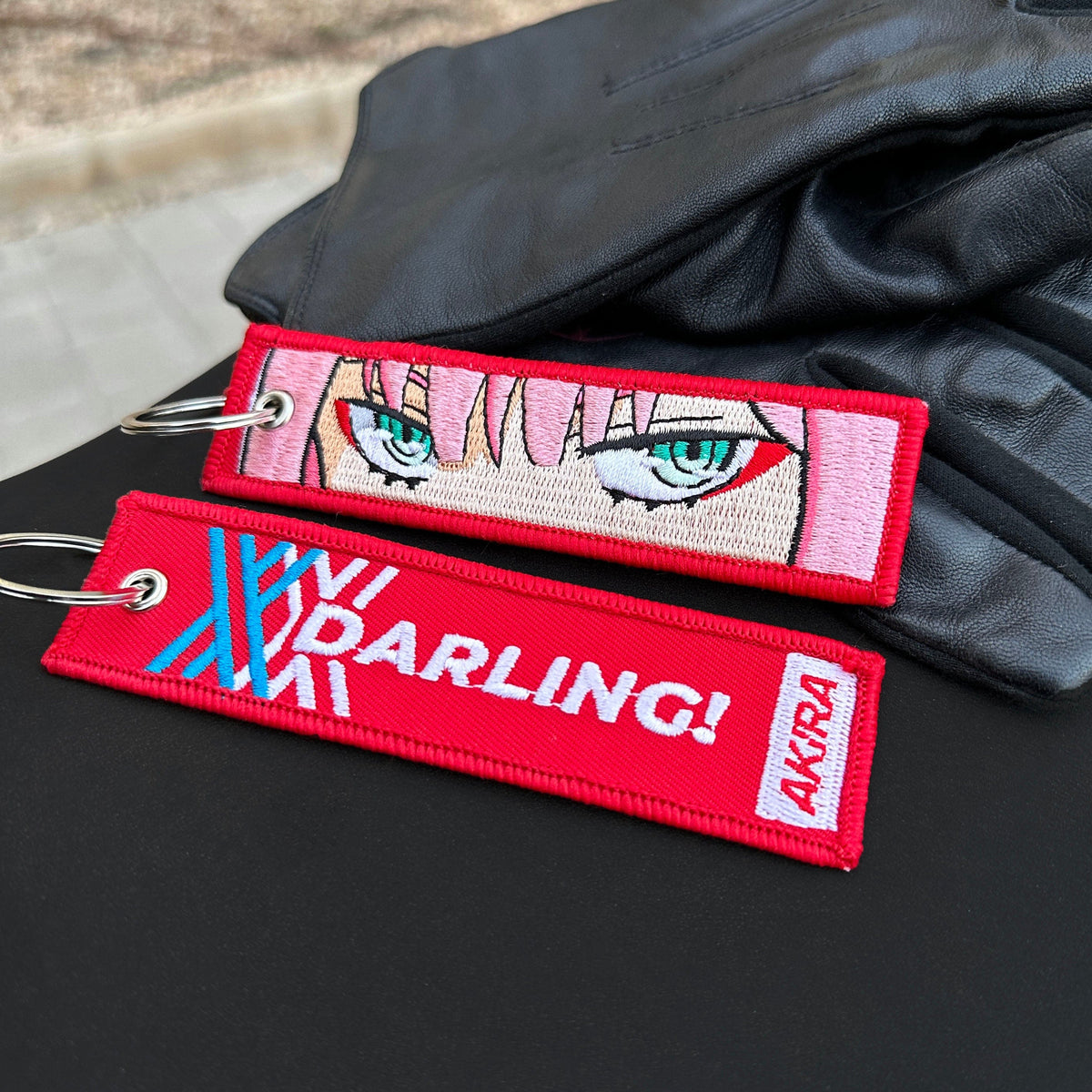 Detail of Zero Two embroidered keychain – soft fabric anime keychain – Akira Gallery
