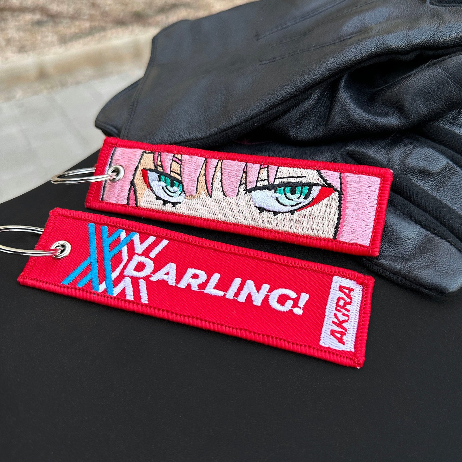 Detail of Zero Two embroidered keychain – soft fabric anime keychain – Akira Gallery

