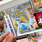 Pokémon Silver Version sticker with Lugia held in front of a retro Pokémon game collection